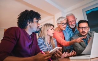 A family meeting discussing caregiving costs with a financial advisor can be extremely beneficial!
