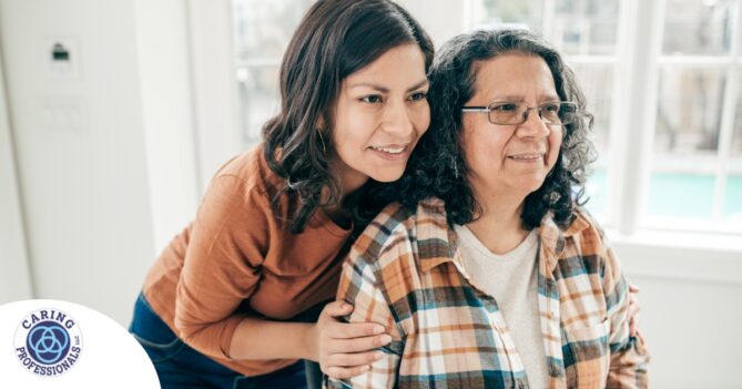 A woman hugs her older mother, representing compassionate senior care