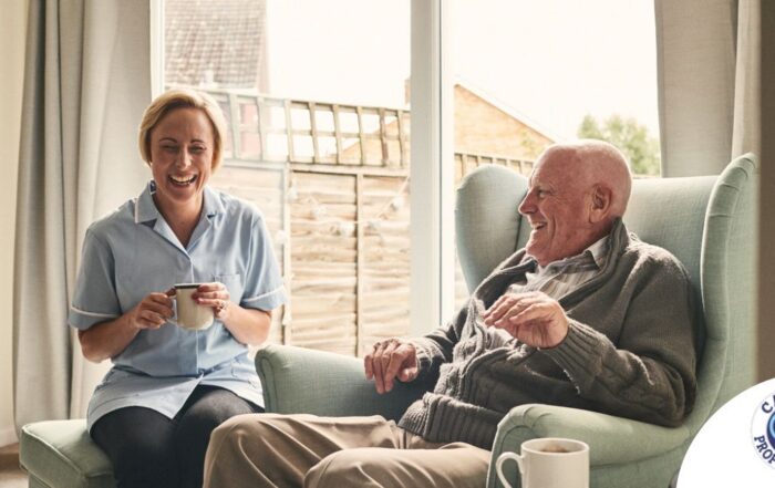 A caregiver provides Memory Care at Home to a senior